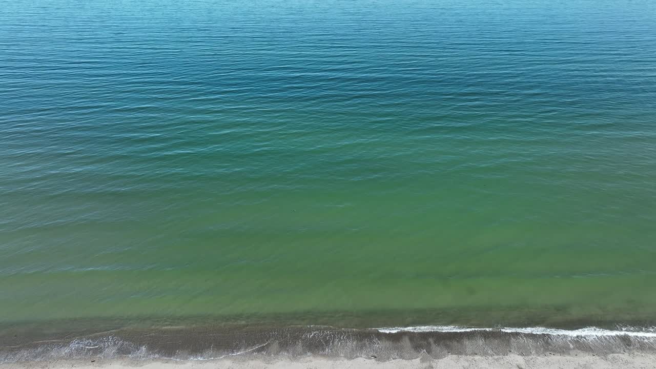 Forward shot of Sandy Neck Beach the barrier beach in the Massachusetts that stretches 6.5 miles long and one and a half miles wide along Cape Cod Bay, Barnstable, USA