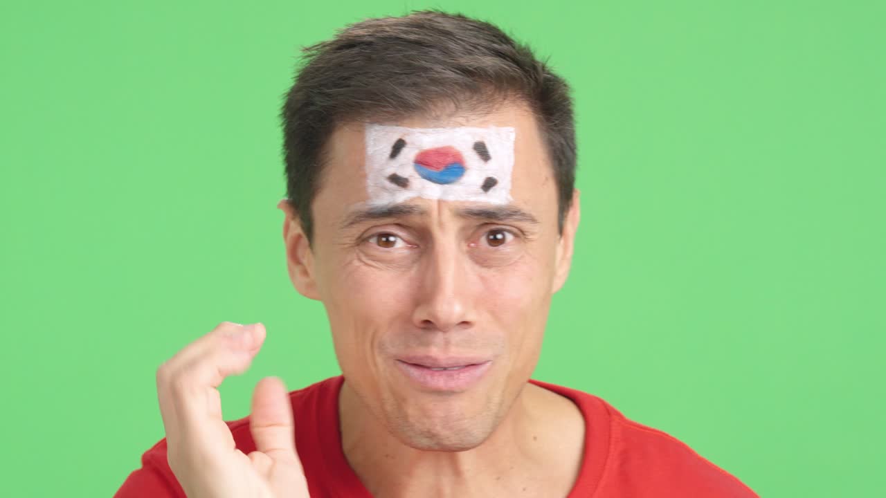 Very nervous man supporting south korean team during a difficult match
