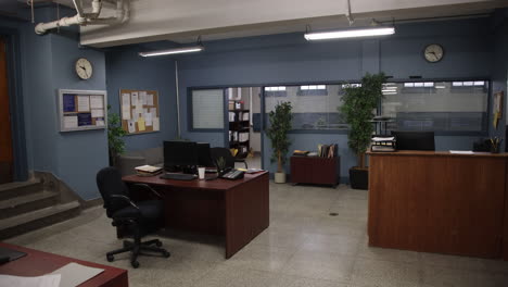 Establishing-shot-of-police-precinct-desks-with-no-people