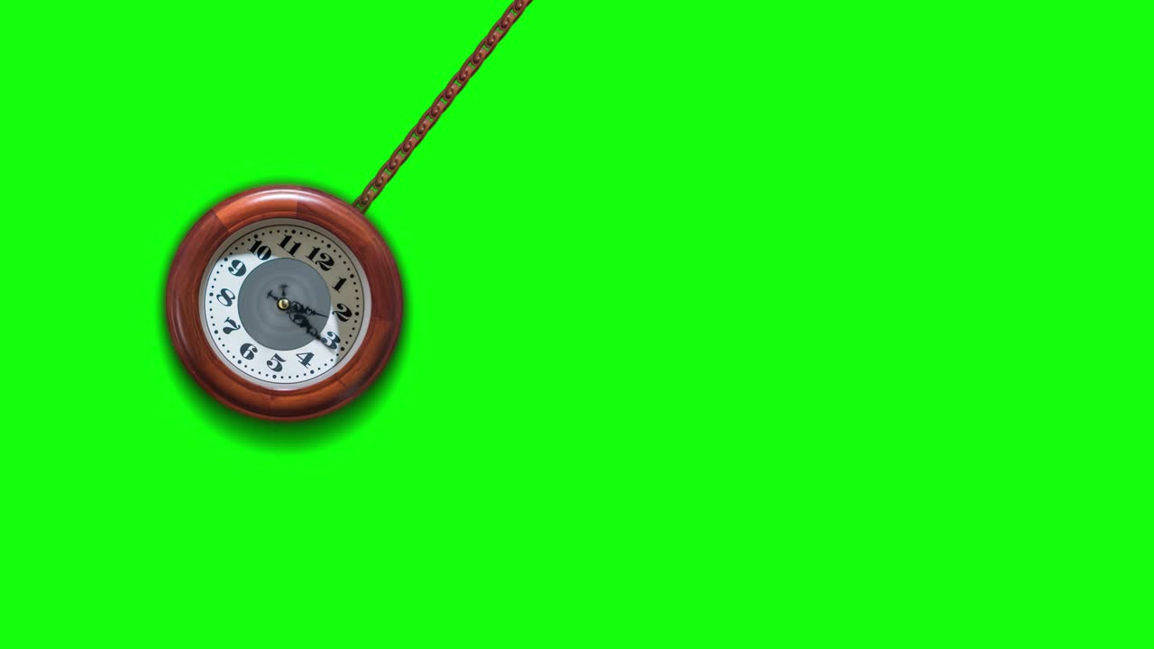 시계는 녹색 화면에 체인에 매달려 있습니다.
