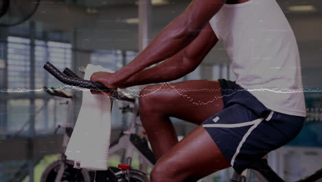 animation of data processing over african american man exercising in gym