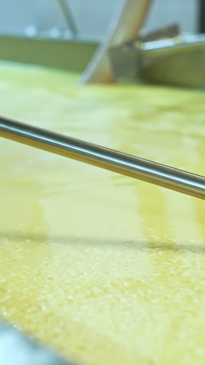 Milk producing factory manufacturing. Food modern organic industry process. Vertical video