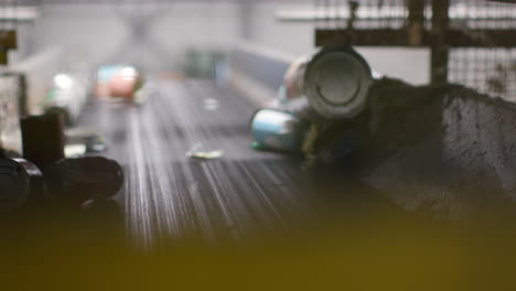 recycling plant for plastic bottles and aluminum cans on a conveyor belt