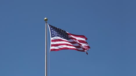 united states of america flag waving on a windy day medium shot