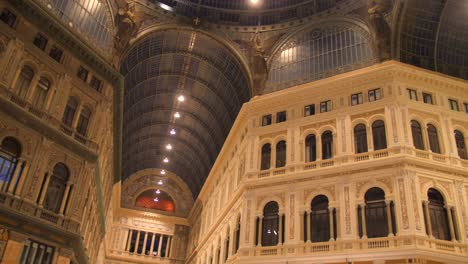 interior of galleria umberto i - high and spacious cross-shaped structure of public shopping gallery in naples, southern italy