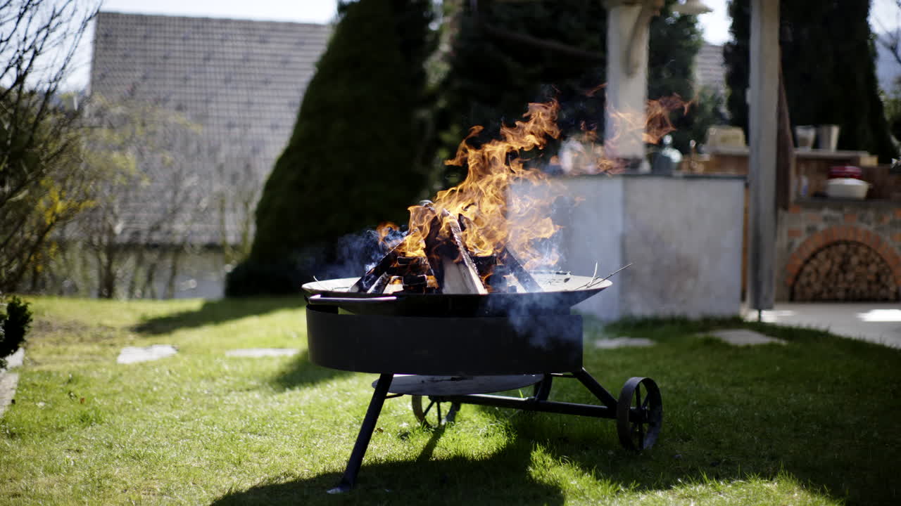 Outdoor fire pit with burning wood