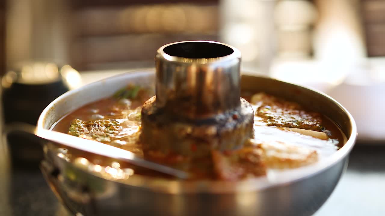 Bubbling soup with catfish and eggs