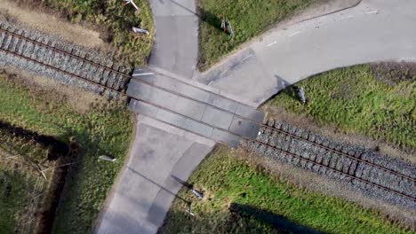 Aerial-drone-shot-slowly-zooming-in-on-railroad