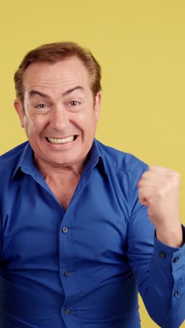man cheering and celebrating with exaggerated expressions