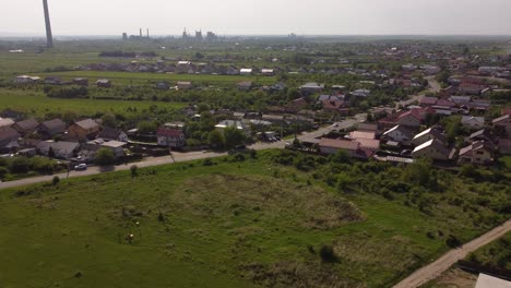 Aerial-Over-Top-View-Beautiful-Small-Green-Town-In-Early-Spring