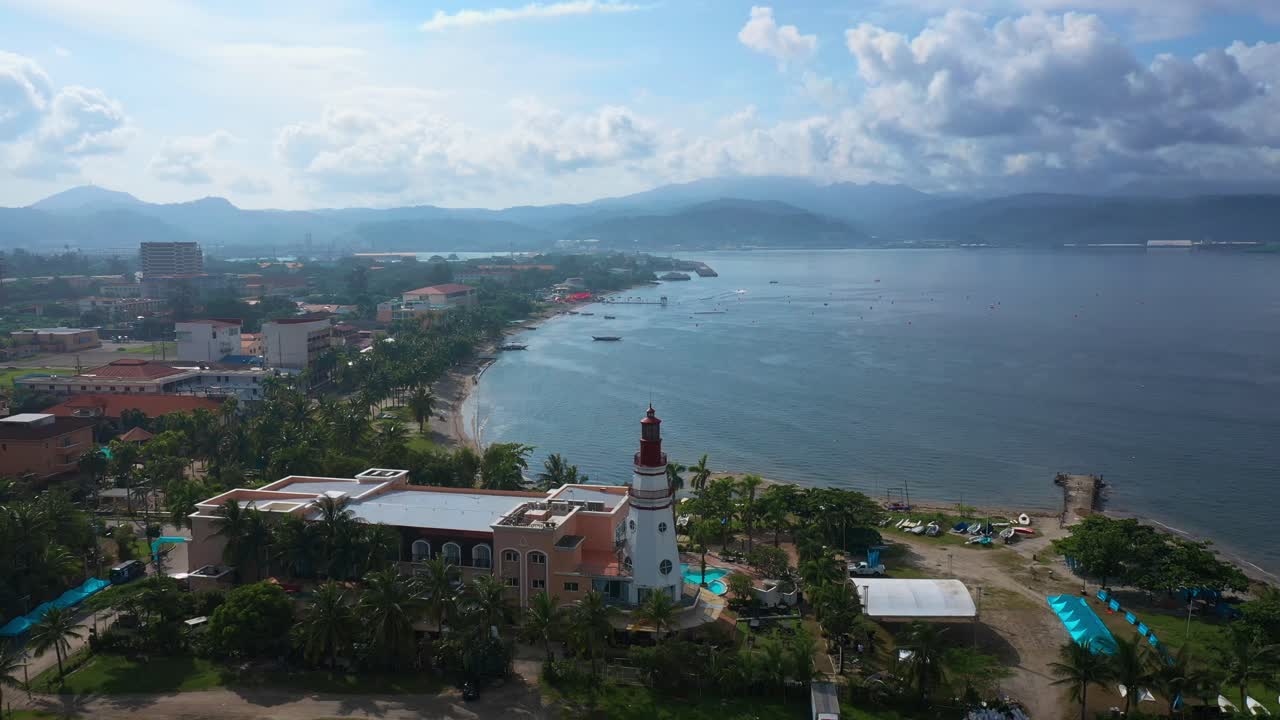 A stunning aerial view reveals the vast Subic ocean, where the deep blue waters stretch toward the horizon under the open sky.