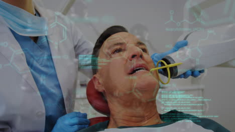 animación de fórmulas químicas y procesamiento de datos sobre una dentista caucásica y un paciente masculino