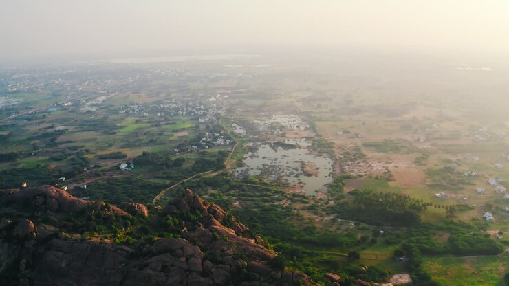 Aerial View of Indian Rural Landscape with Mountains and Village