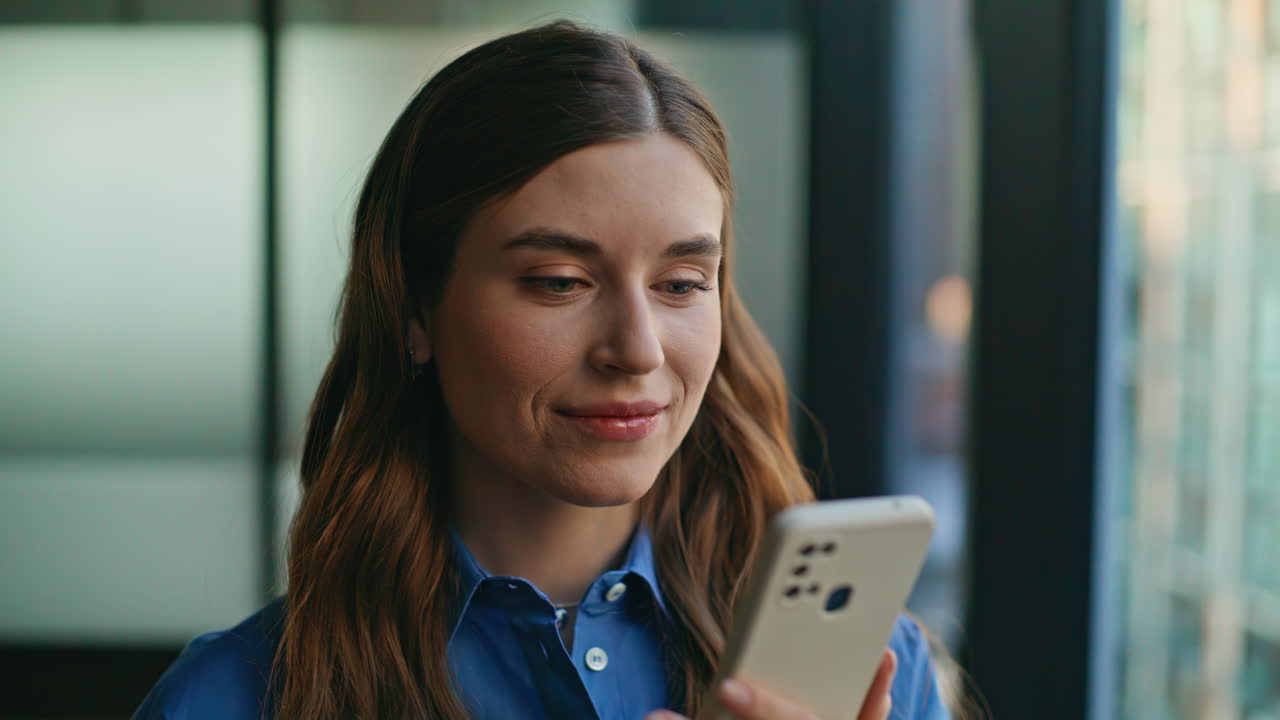 Lady hands holding phone workplace closeup. Businesswoman messaging smartphone