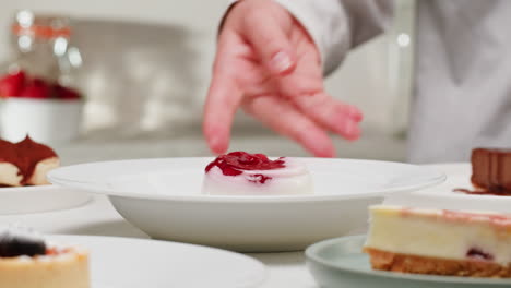 chef serving panna cotta dessert