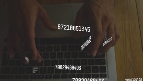 animation of changing numbers, letters, cropped hands of caucasian man typing on laptop