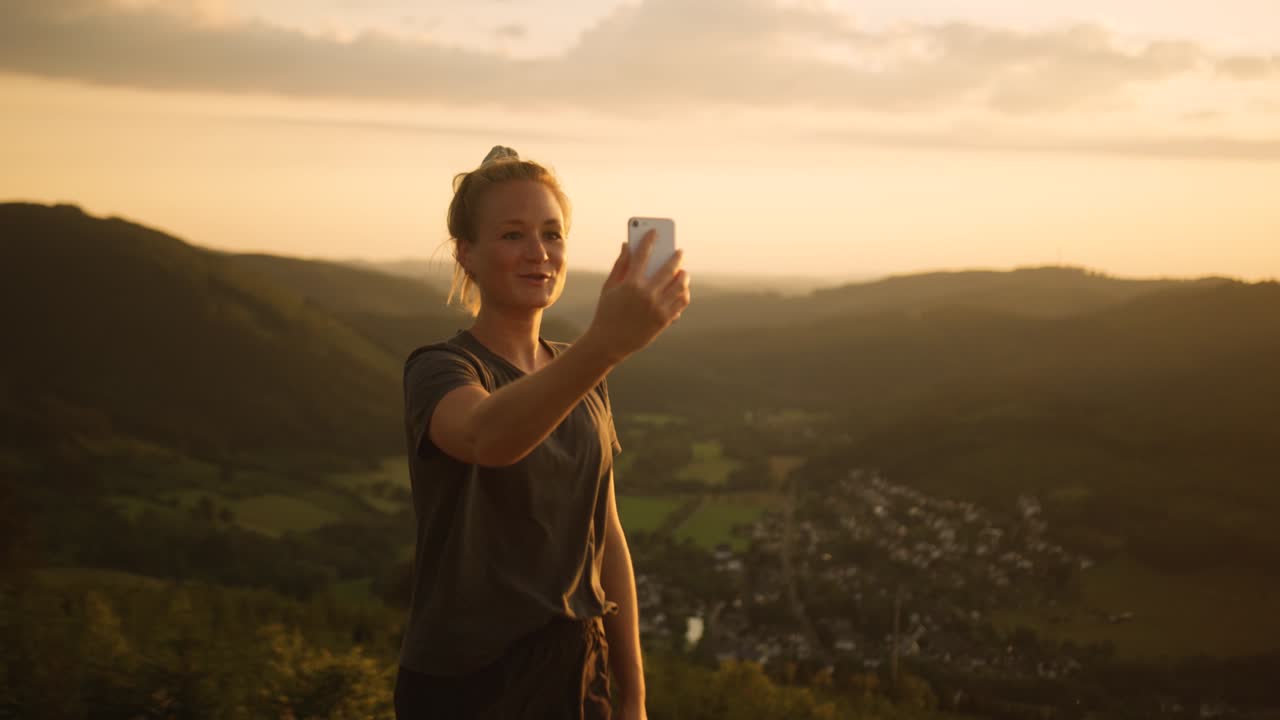 Woman taking a selfie on a hike