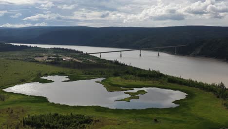 drone flying over the yukon river bridge known as the e