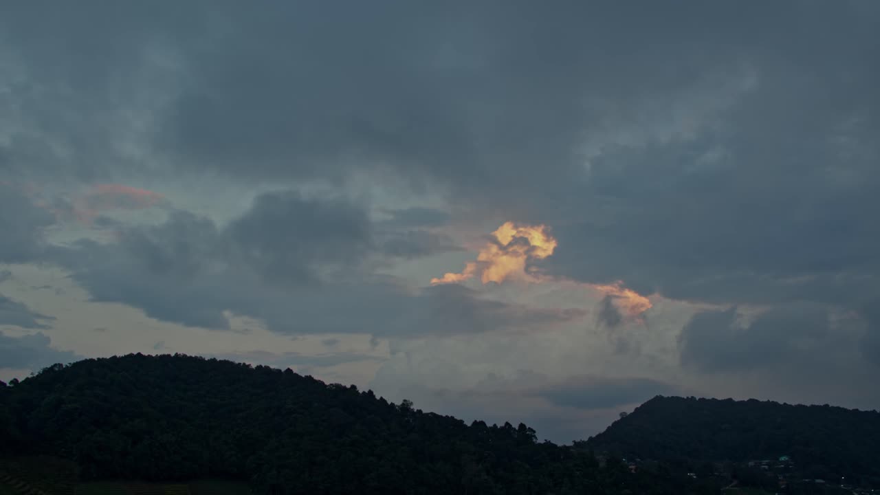Dramatic Clouds Over Mountains at Sunrise/Sunset