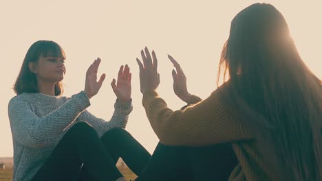 girls do morning train clapping hands in camp slow motion