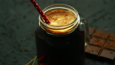 beverage in mug and chocolate