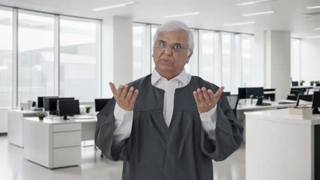 indian senior lawyer presenting his case in court