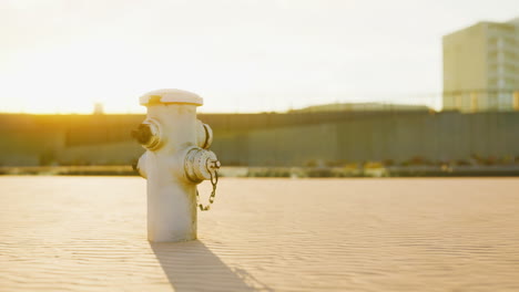 old hydrant on a seaside promenade