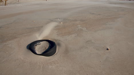 trash on the beach in north carolina