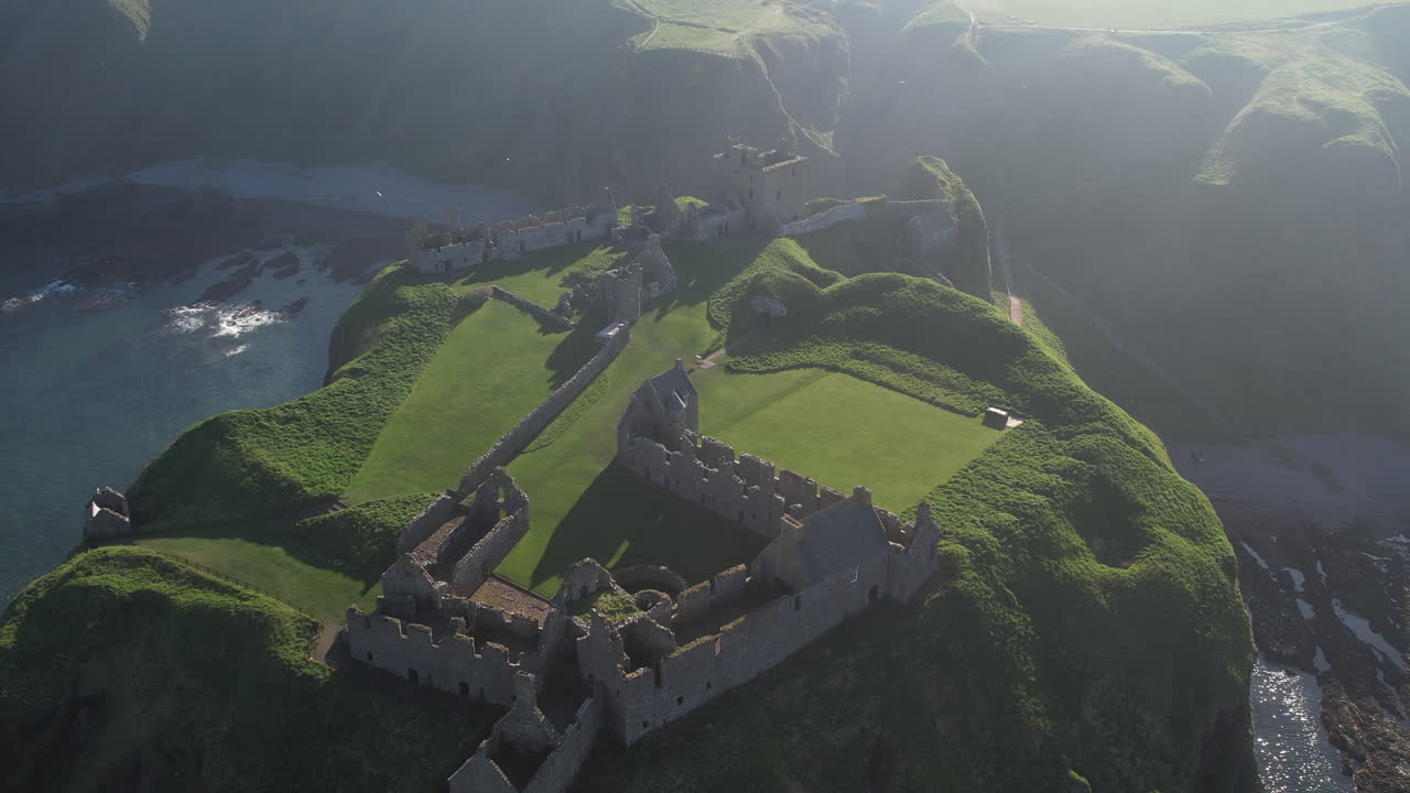aerial view as the crow flies over the ruins of dunnottar castle in scotland
