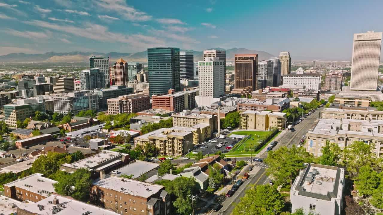 Salt Lake City Utah Skyline at Day, Mountains Behind, Aerial Drone
