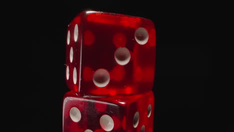 Stack-of-transparent-red-dices-with-certain-number-of-dots