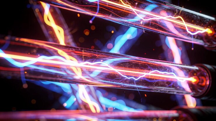 Alimentazione di tre tubi di vetro paralleli in uno studio buio, con filamenti luminosi che si muovono e scintillano.