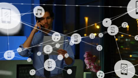 Animation-of-network-of-connections-with-icons-over-caucasian-businessman-using-smartphone