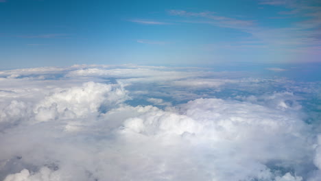 high-altitude cloudscape view from an airplane