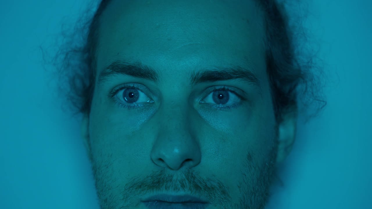 Close-up of a Man's Face with Eyes Closed, Relaxed and Peaceful