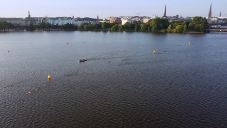 Aerial-view-of-the-outer-alster-lake-with-swimmmers-during-Ironman-in-Hamburg