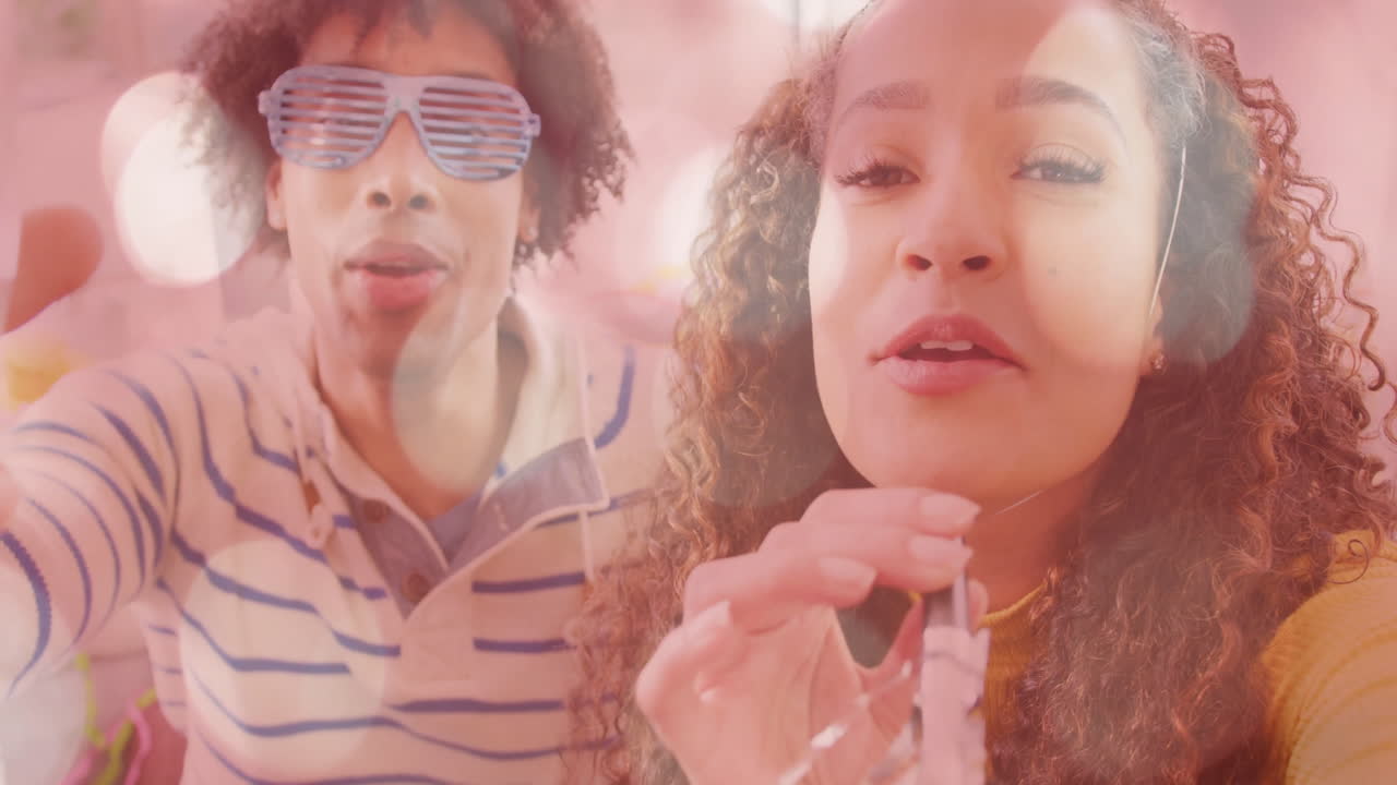 Enjoying party with pink bokeh lights animation, people having great time