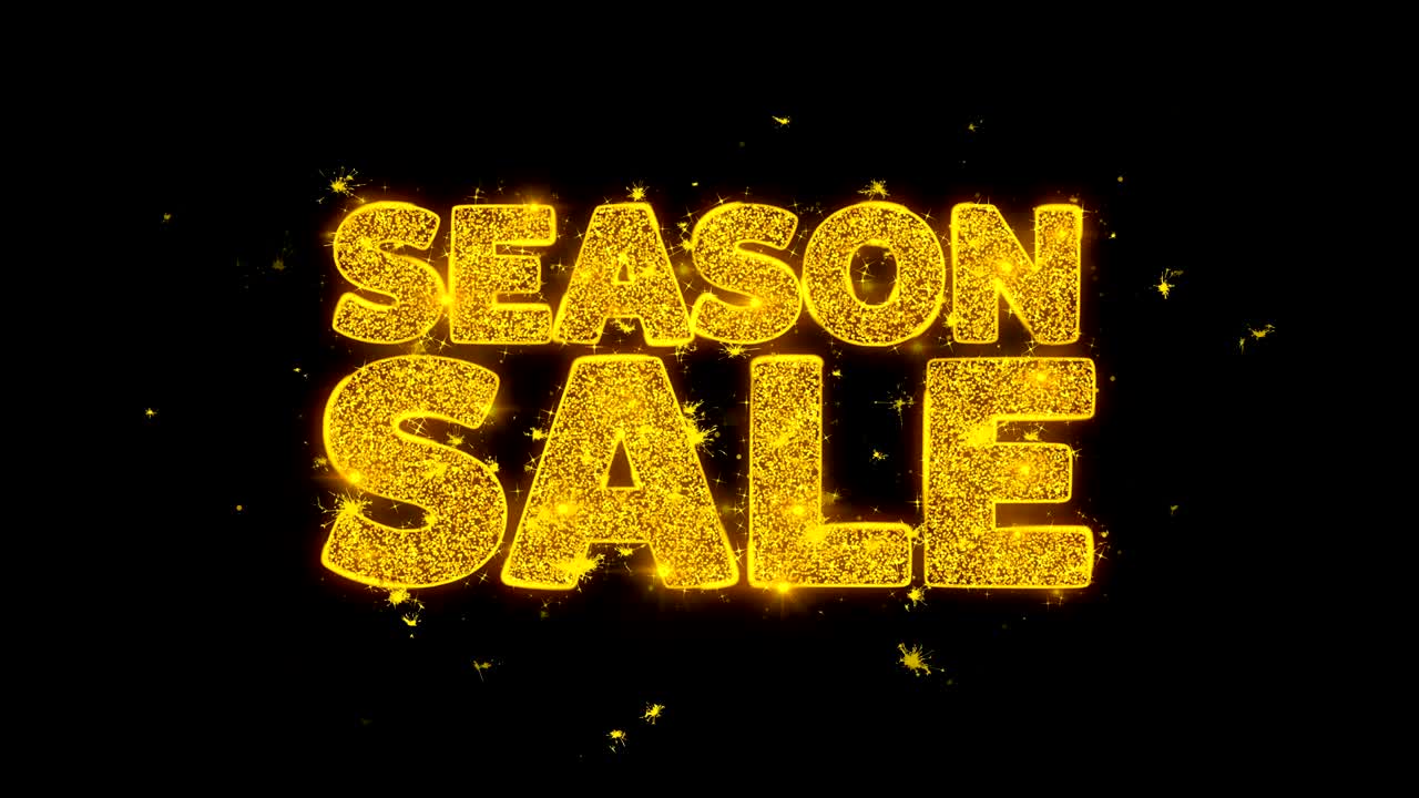 금색 입자로 쓰여진 타이포그래피는 불꽃놀이를 일으킨다.