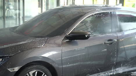 washing-car-with-foam-in-carcare