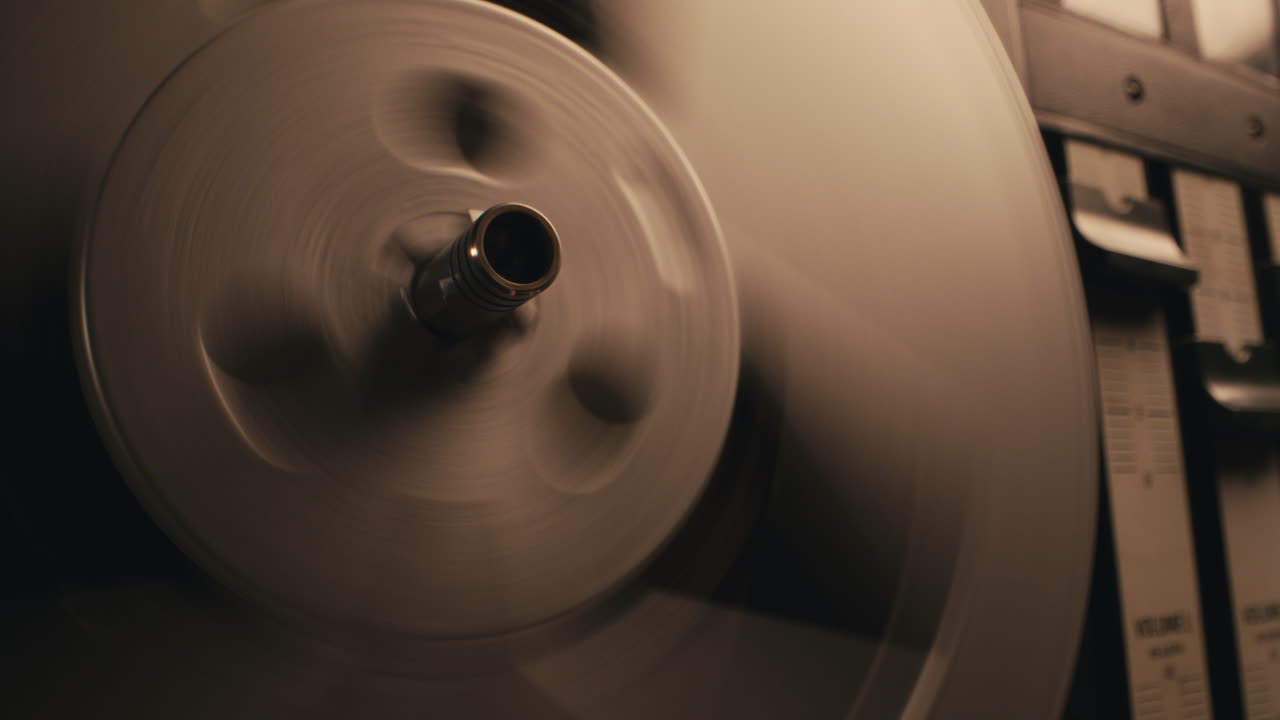 A vintage tape recorder in a blinking light