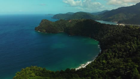 A-stunning-coastline-view-of-bays-and-coves-with-mountains-in-the-background