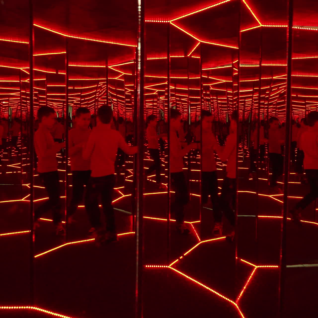 Boy playing with distorted mirror. Museum of entertaining sciences Square video