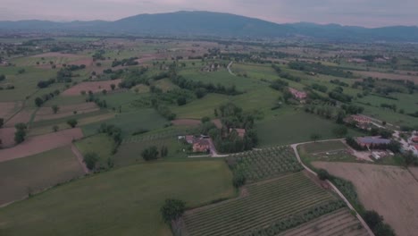 aerial drone shot tilt up on italian countryside in umbria, italy
