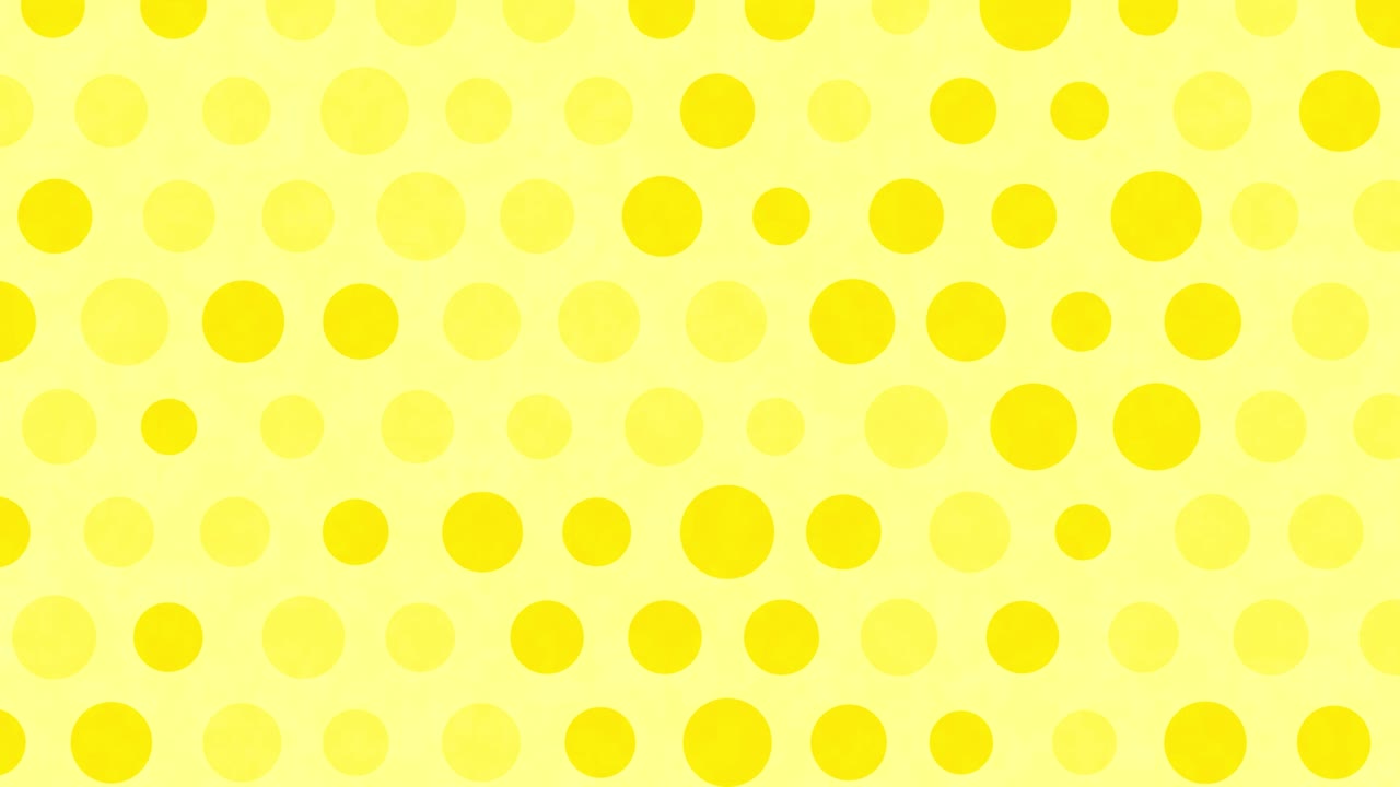 Yellow polka dots move on a background.