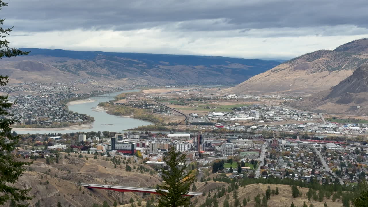 Panoramic view of Kamloops city with Thompson River winding north.