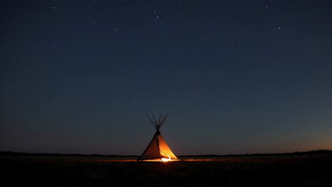 tepee under a starry night sky