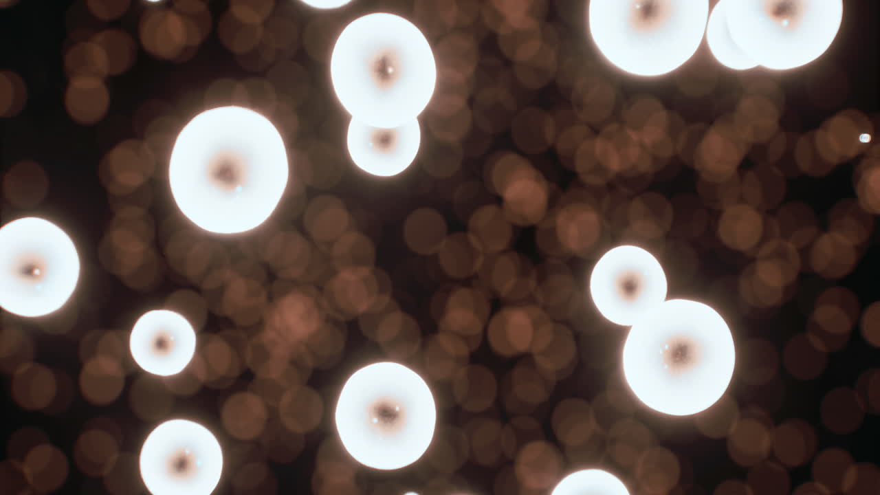 Illuminated orbs create a magical atmosphere in a soft glowing setting