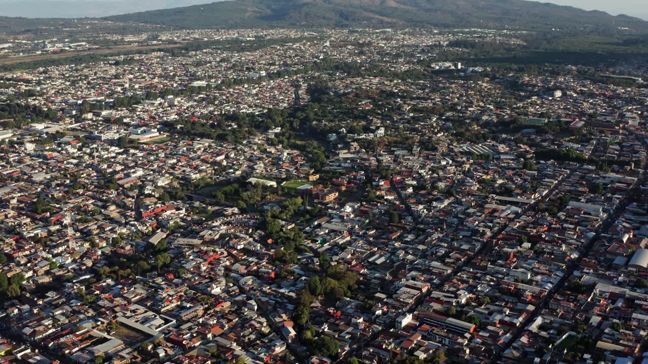 DRONE SHOT OF URUAPAN CITY IN MICHOACAN AT THE EARLY MORNING
