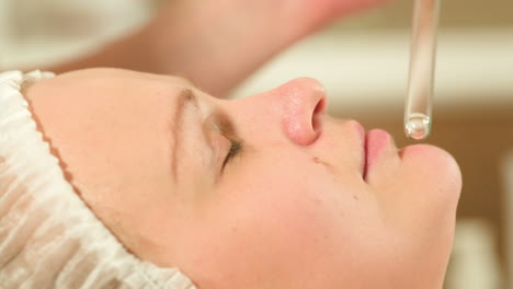 facial procedure at beauty spa with laser using