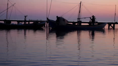 fishing boats at sunrise/sunset